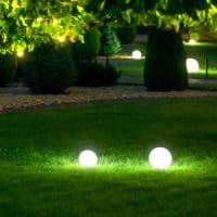 beautiful green grass with light balls at night