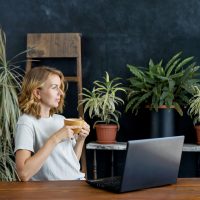 woman sitting in a office with no windows