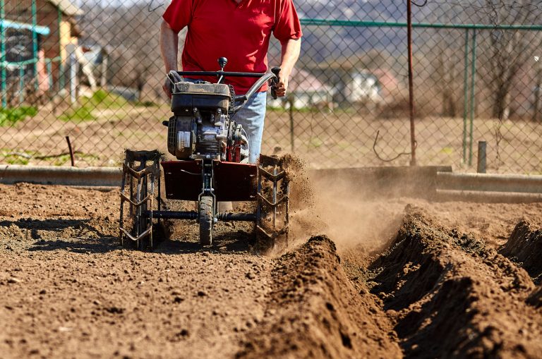 man using tiller