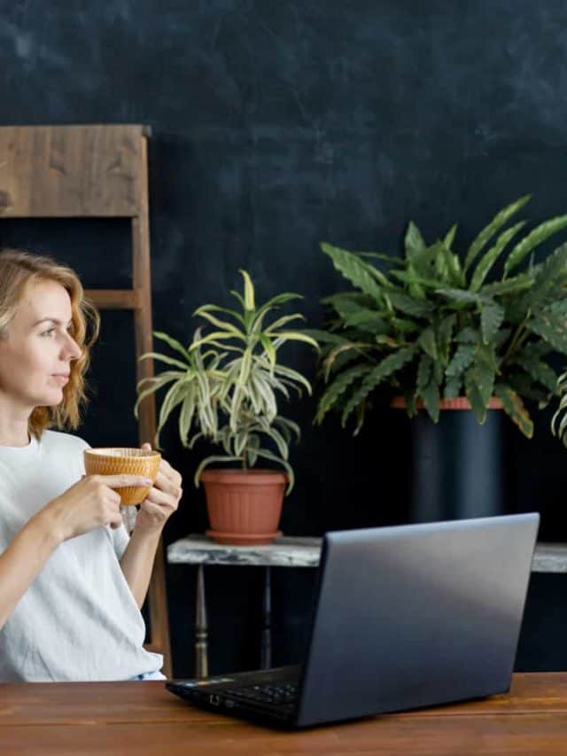 woman sitting in a office with no windows