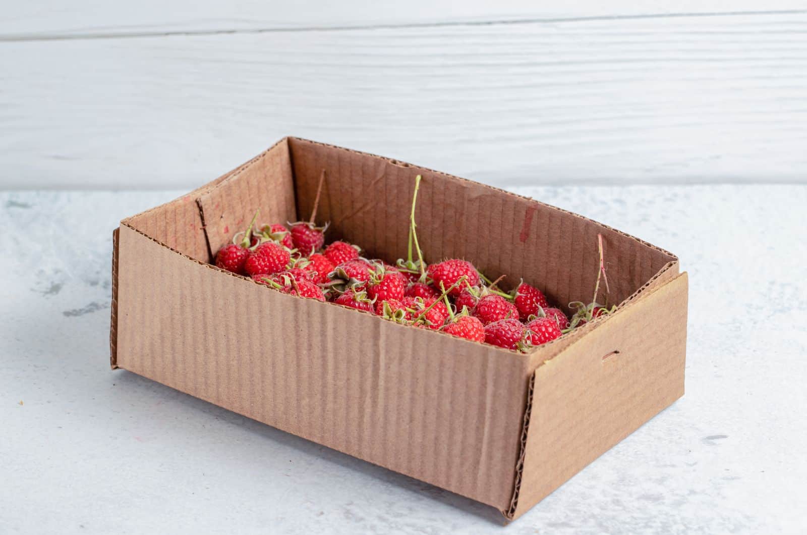 Raspberries in box