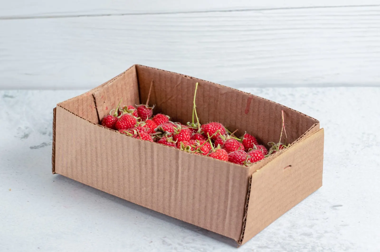 Raspberries in box