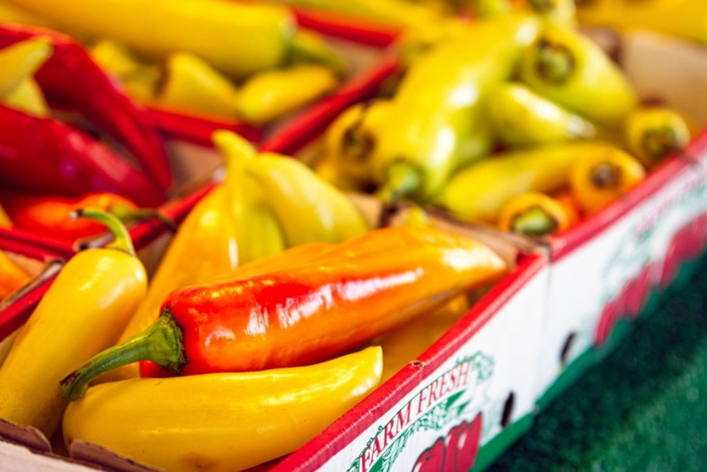 Fresh Hungarian Wax or banana peppers on display for sale