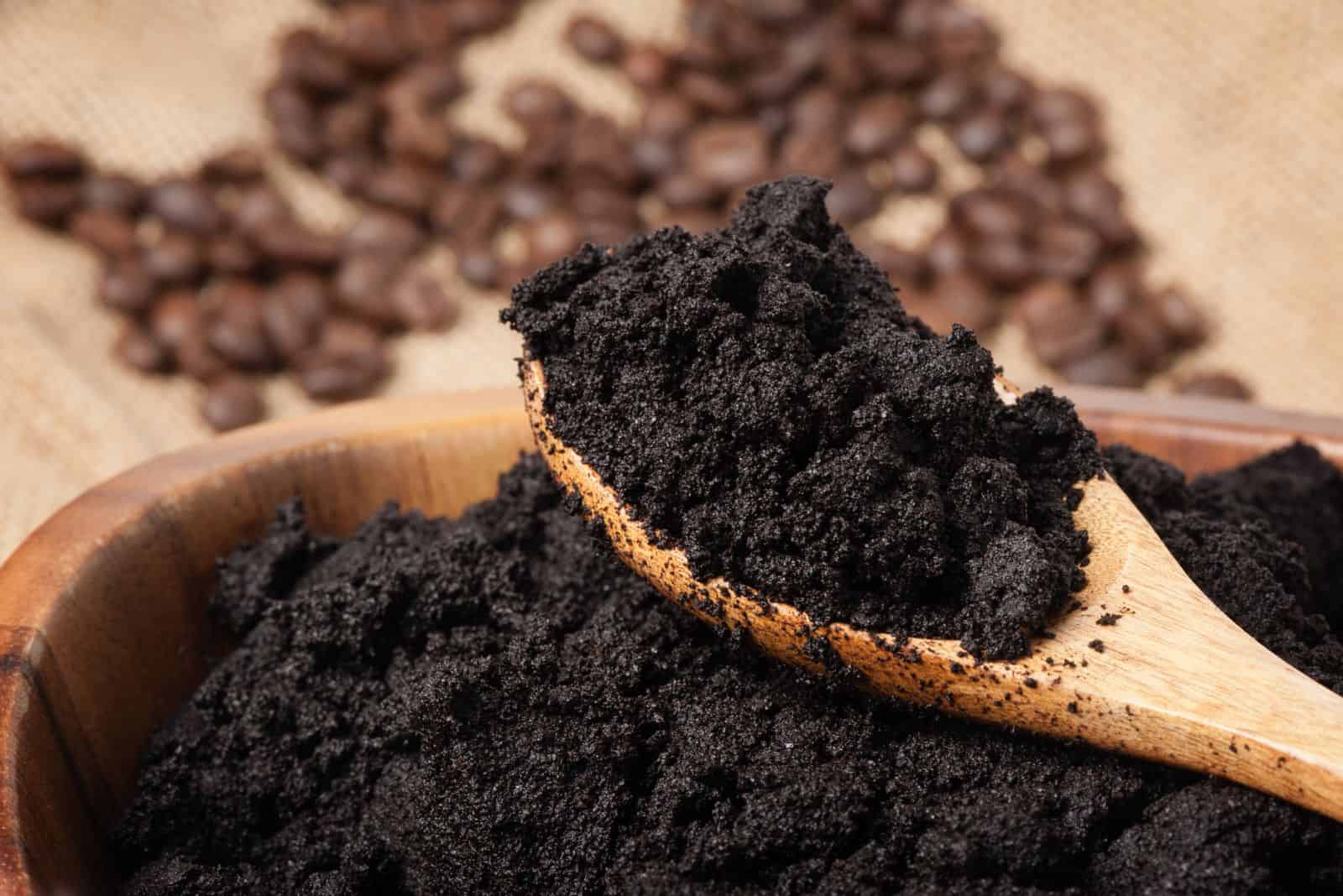 coffee grounds in a wooden bowl
