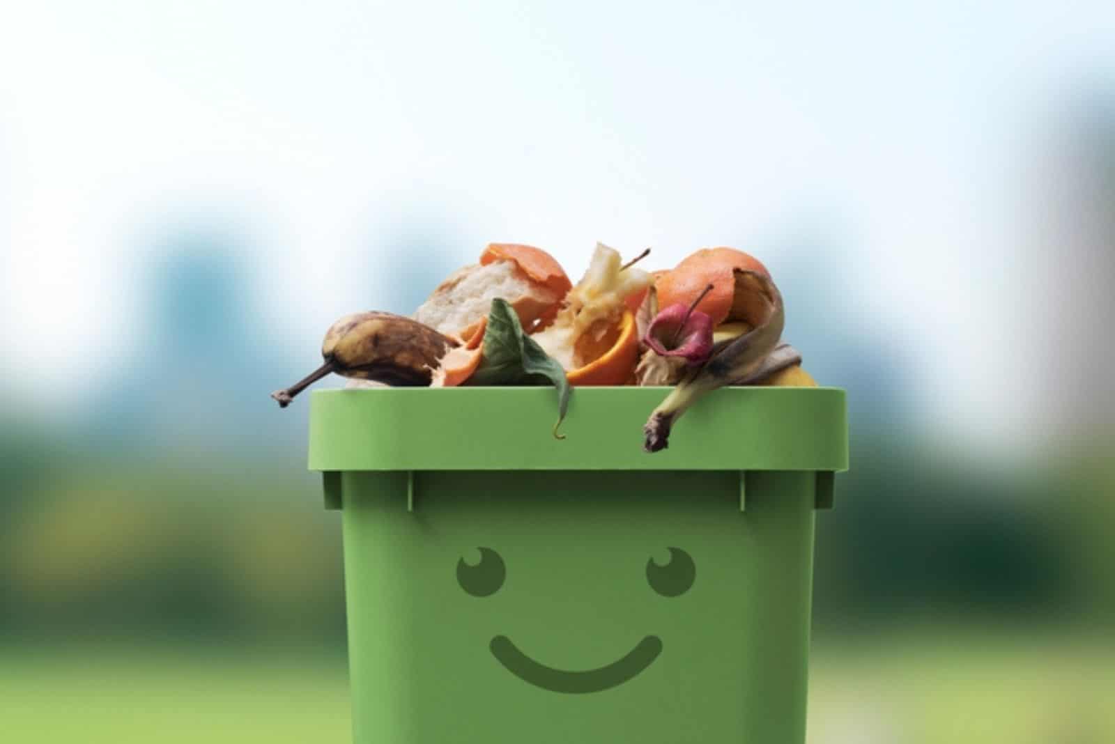 cute garbage bin character full of organic biodegradable waste