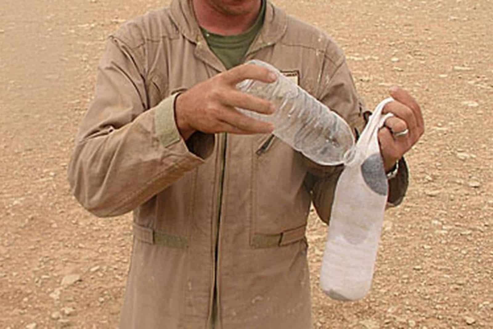 a bottle with a sock