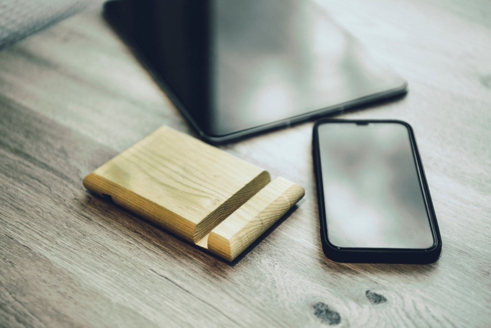 phone holder and phone on table