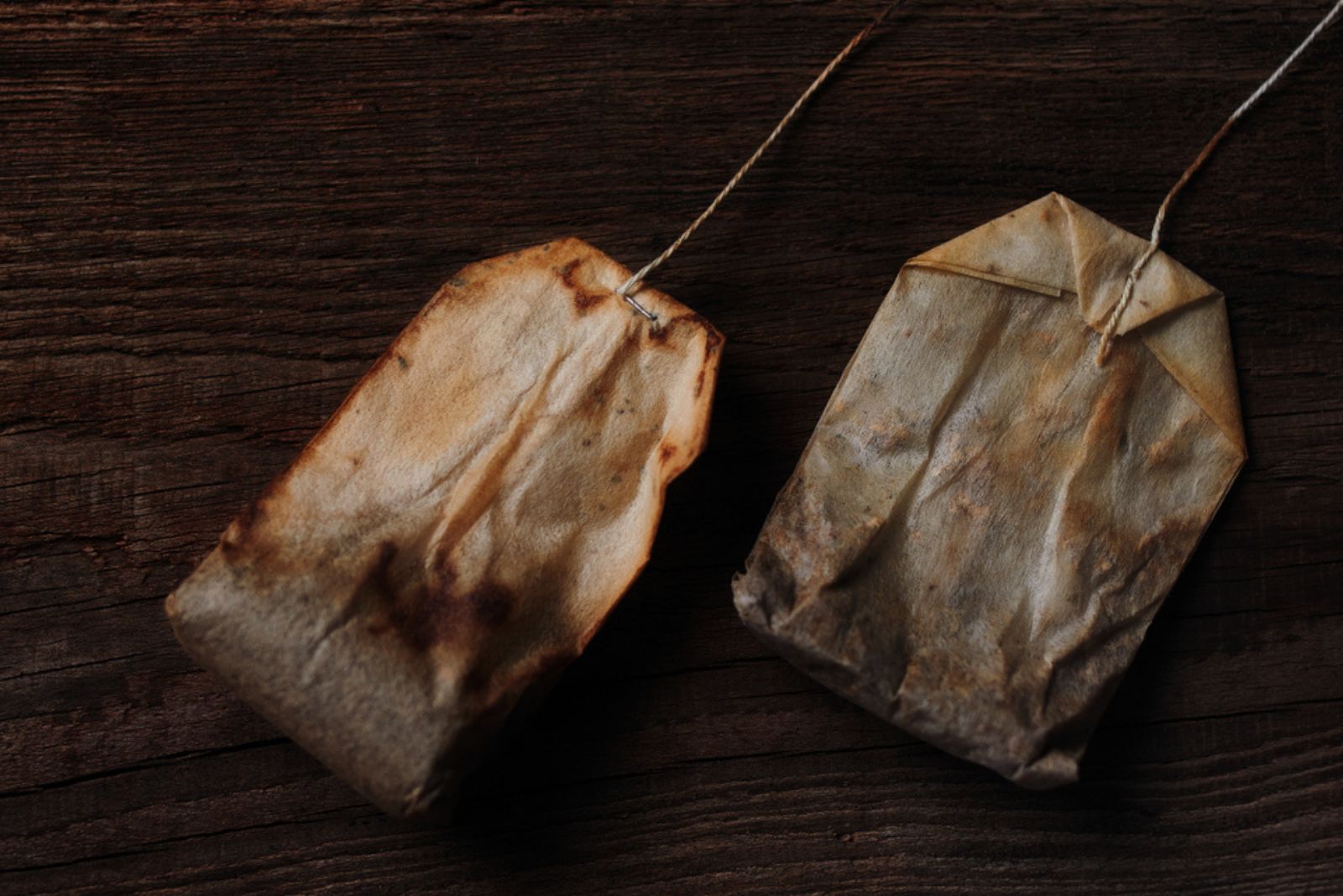 tea bag on wooden floor