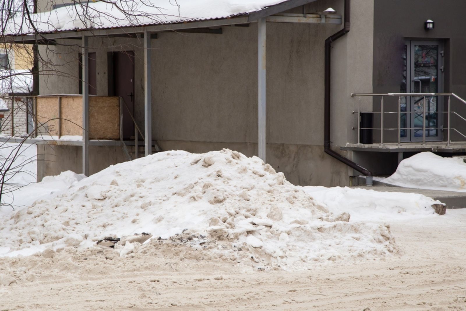 a snow pile away from house