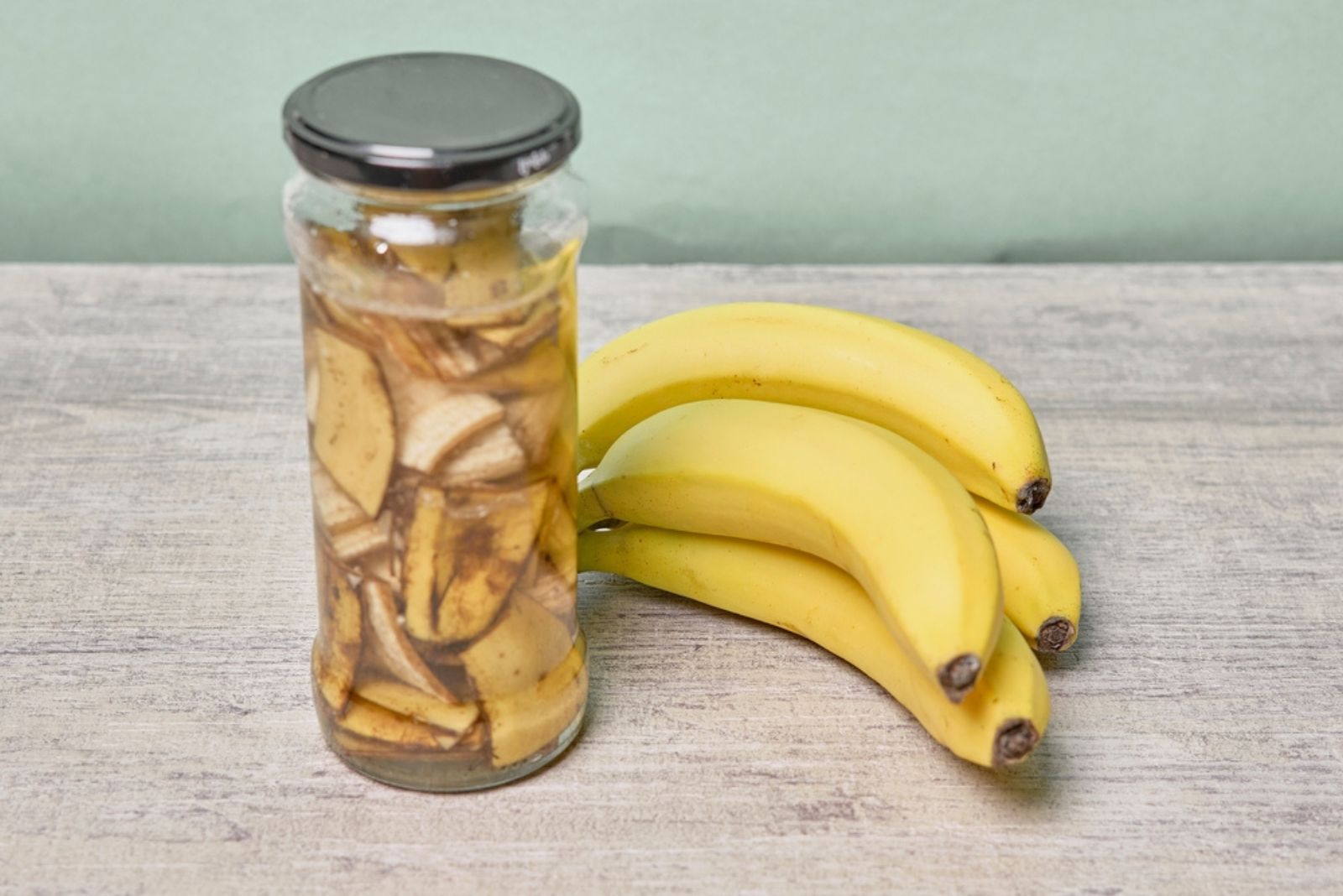 a jar filled with banana peel