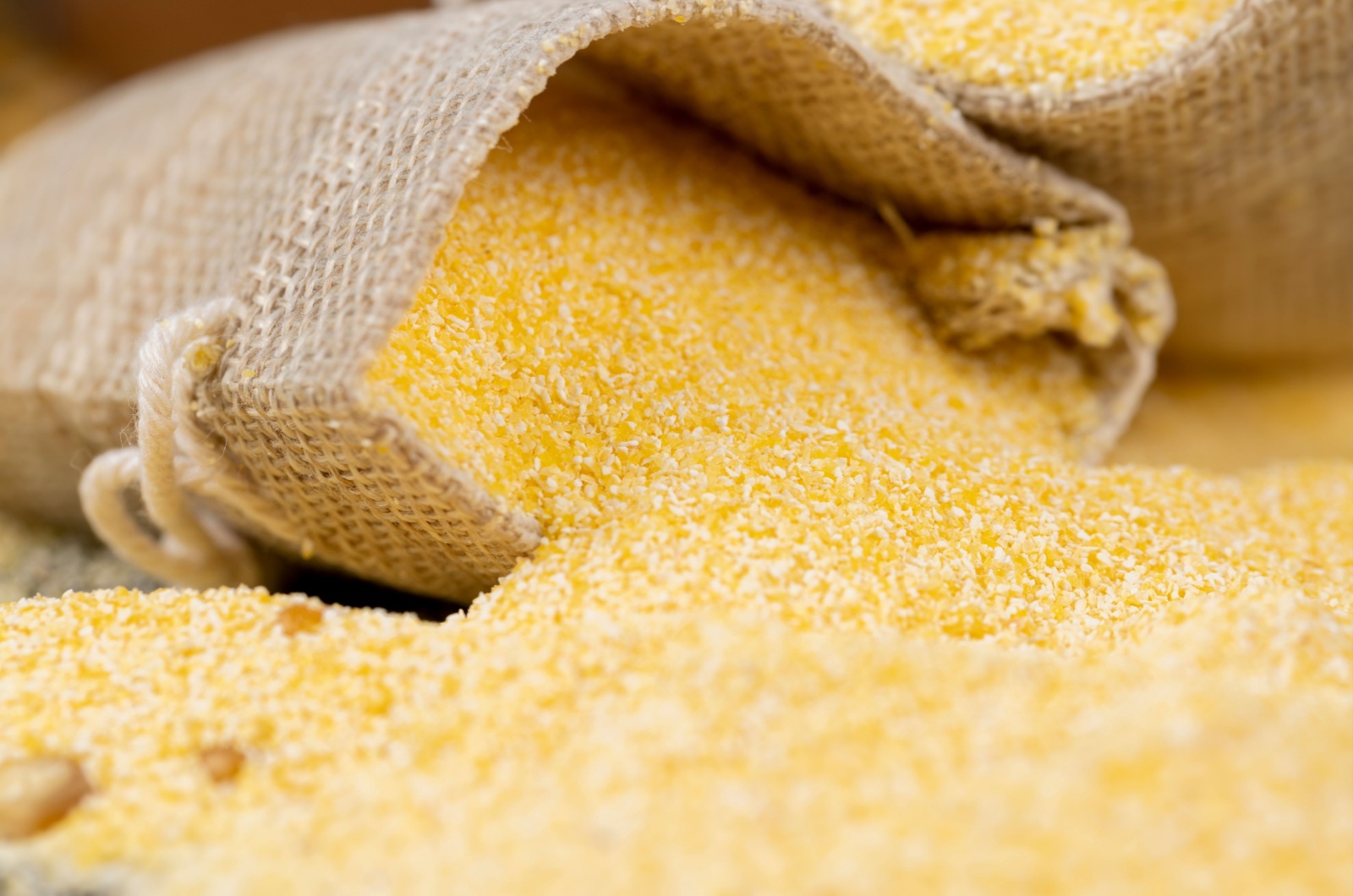 cornmeal spilling out of a bag