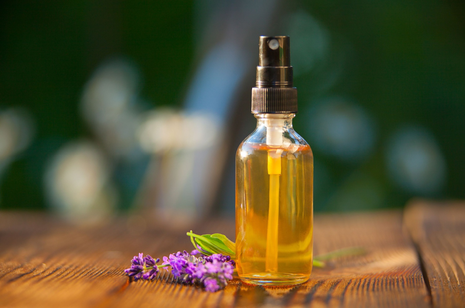 lavender oil in a bottle on the table