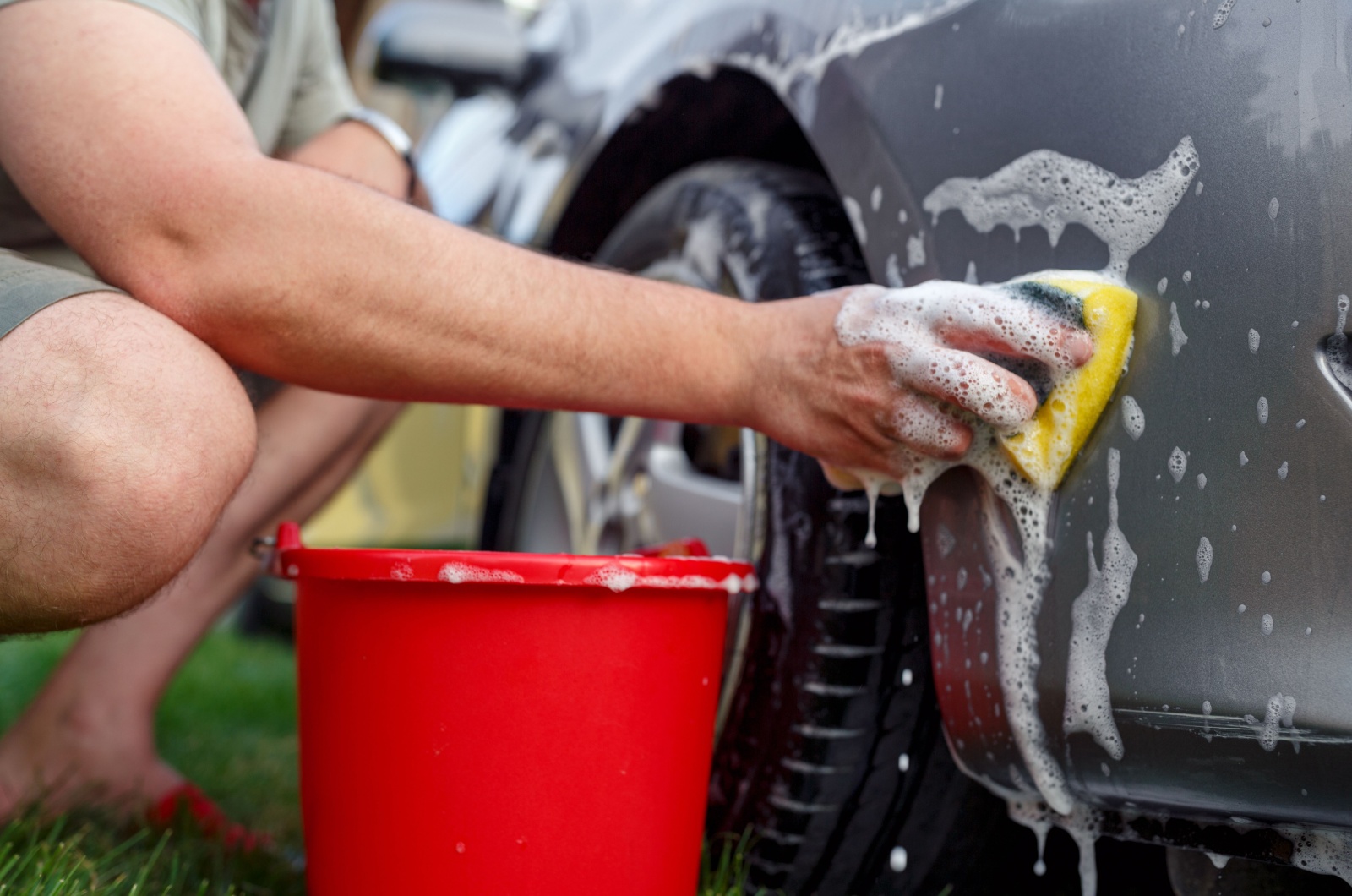 man washing the car