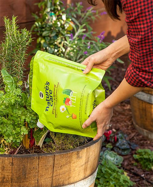 woman using fertilizer