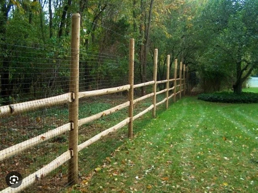 wooden pillars with a fence