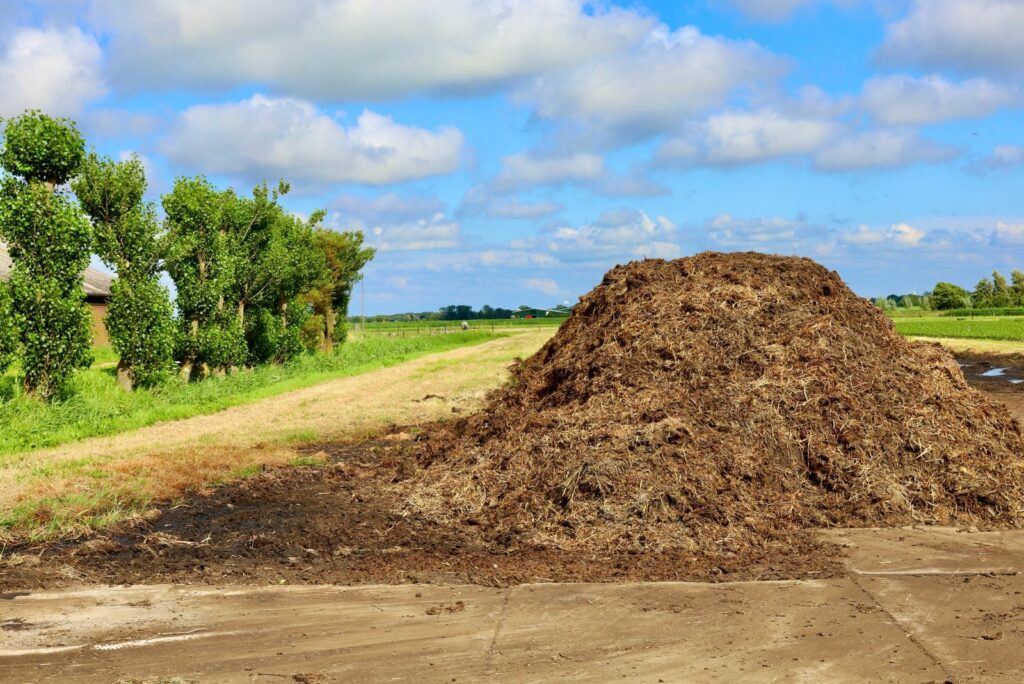 Farm, manure by the road