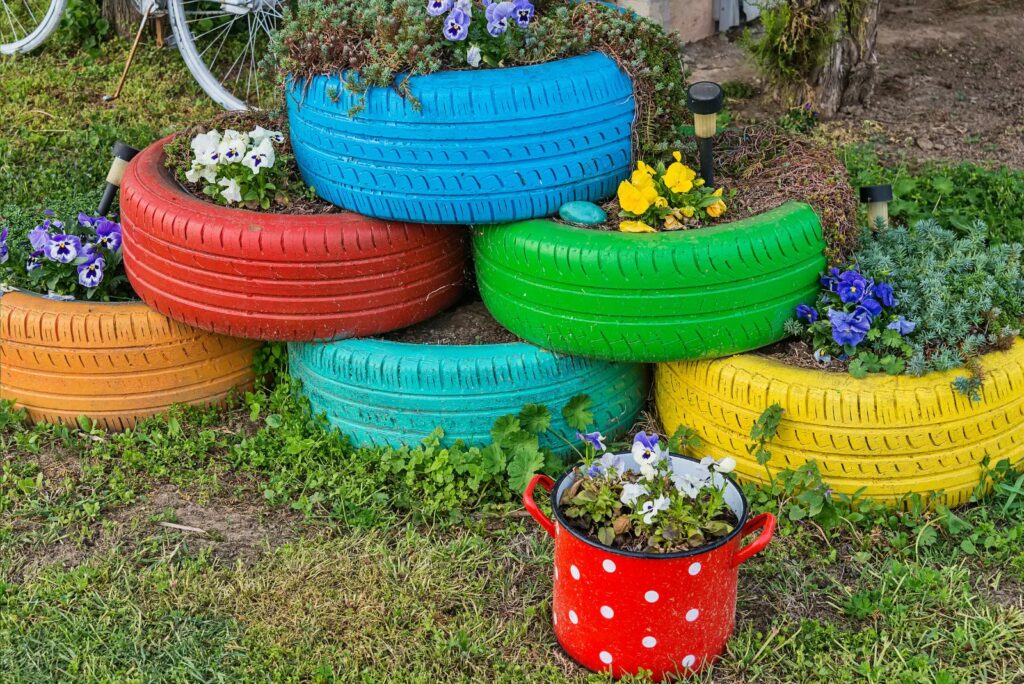 The colorful flowers and tire pots