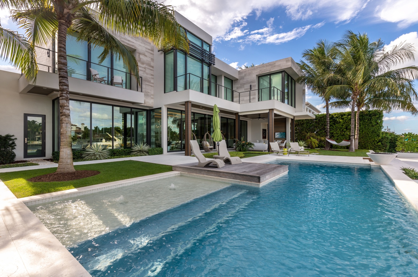 pool and palm in garden