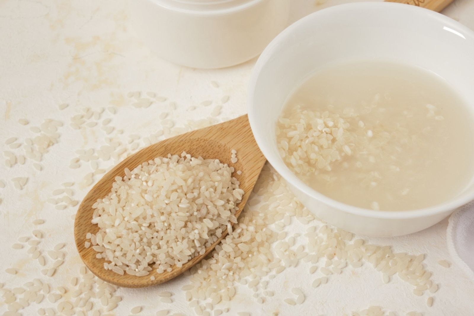 rice water in bowl and spoon