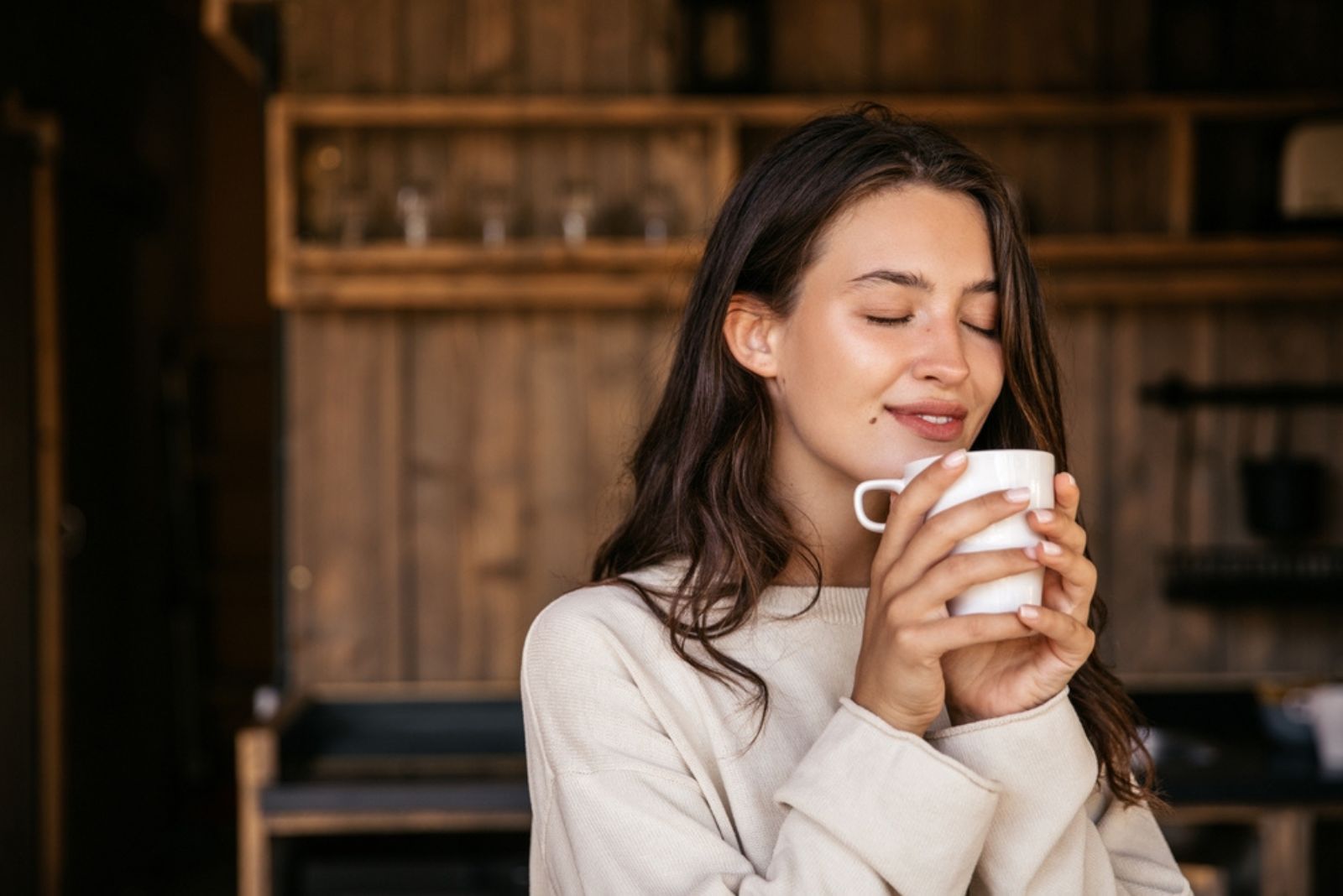 young woman enjoying her cup