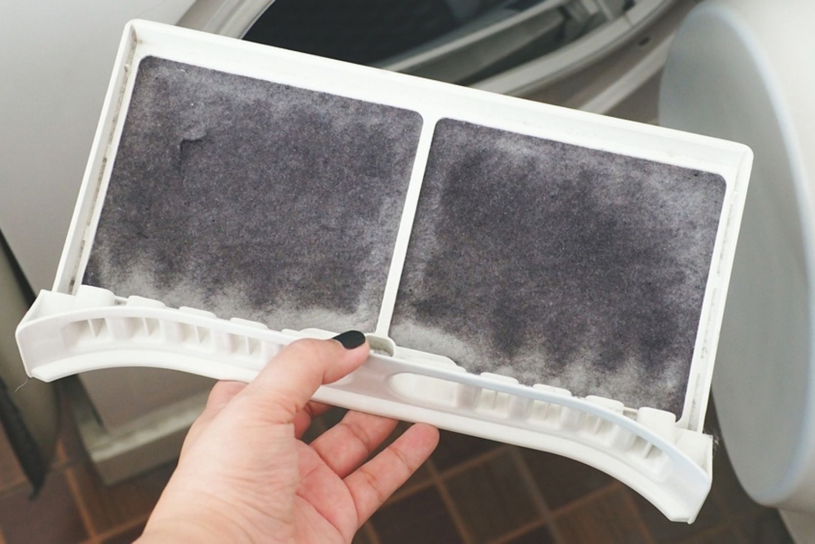 Dryer Lint on a washmachine piece