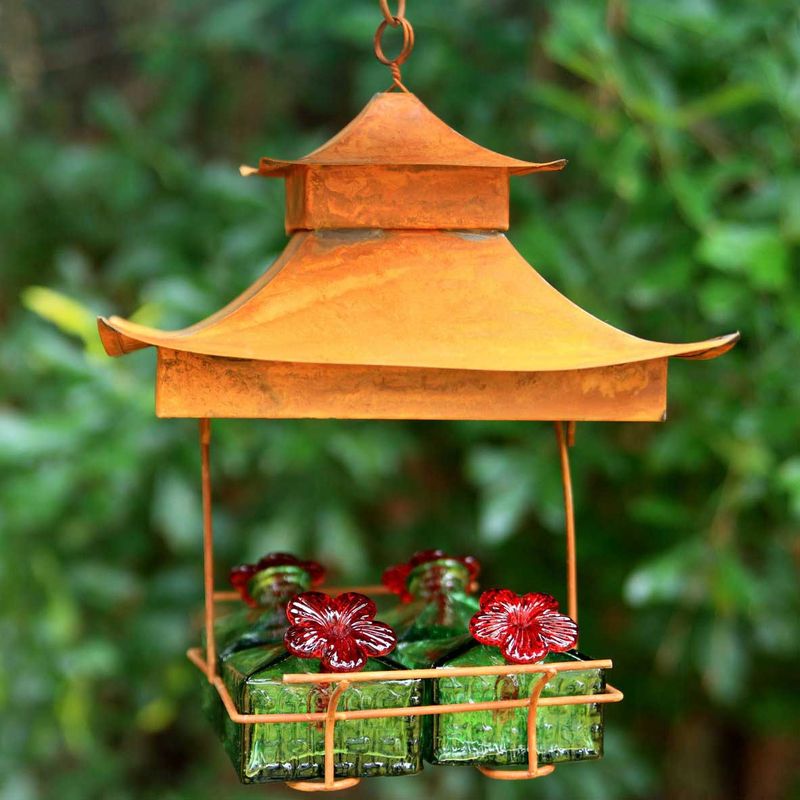 Position feeders near shrubs for shelter