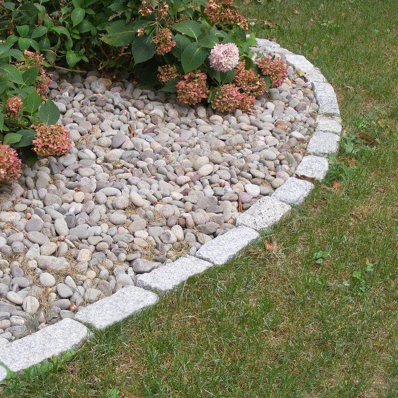 Try a cobblestone edge for charm