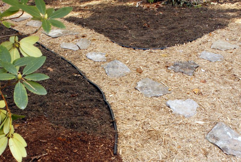 Add Mulch Paths Between Garden Beds