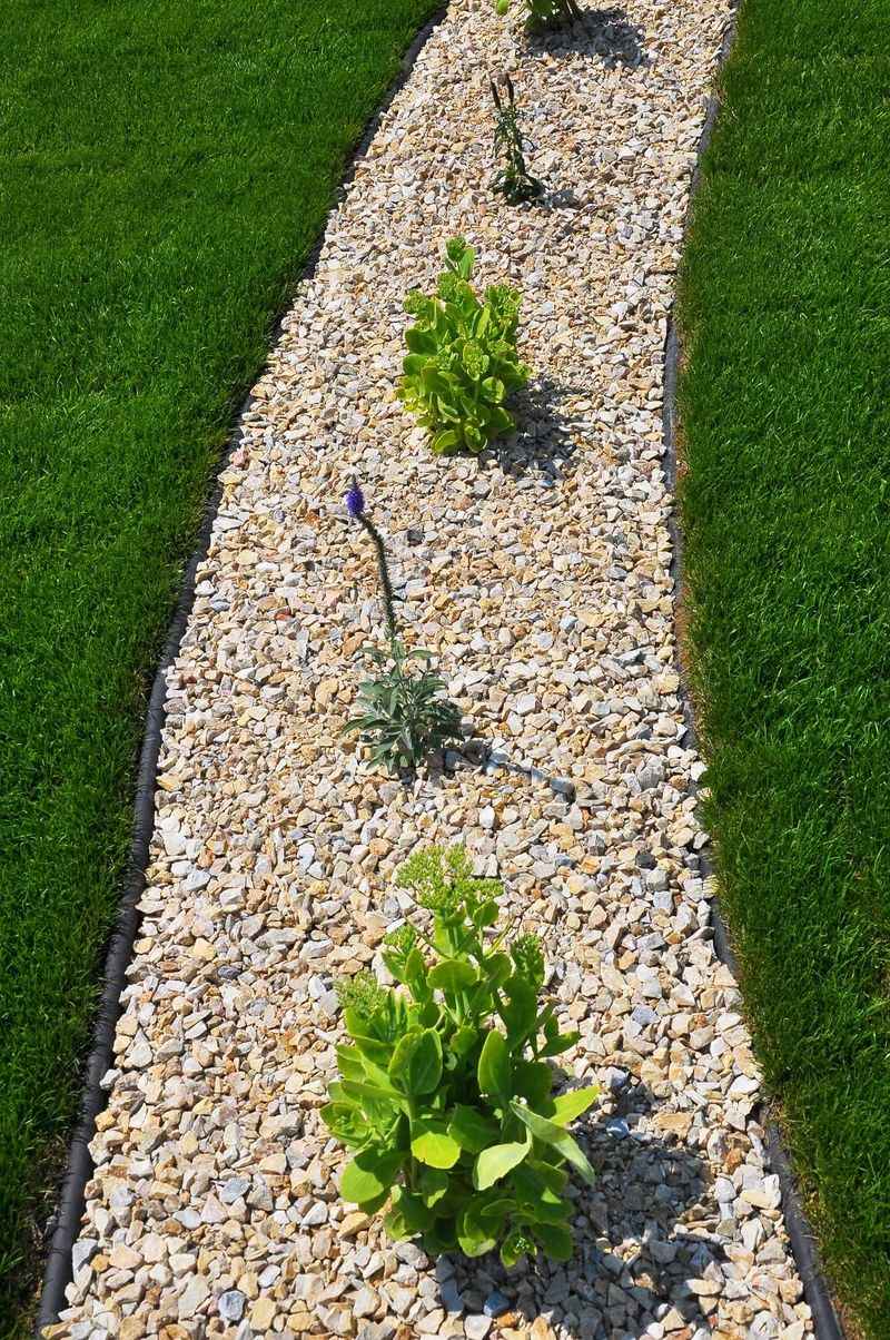 Use garden edging with built-in drainage