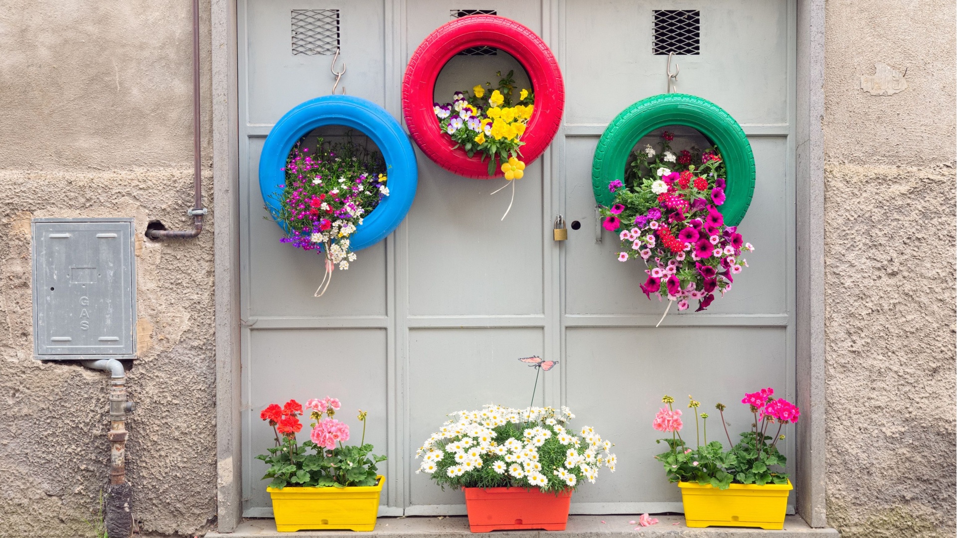 old tires as colorful planters