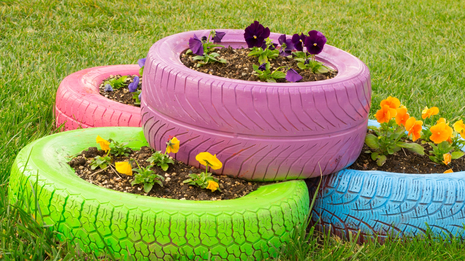 painted old tires as planters