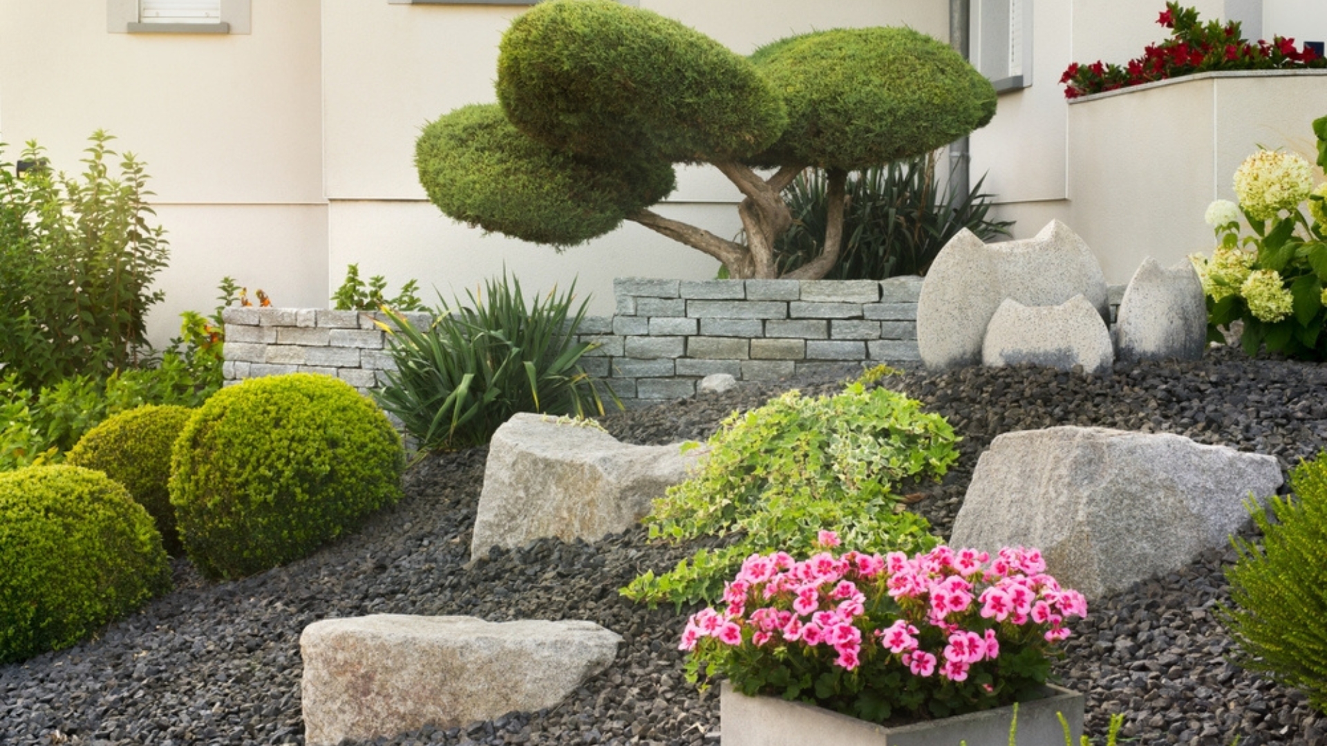 front yard with rocks and mulch