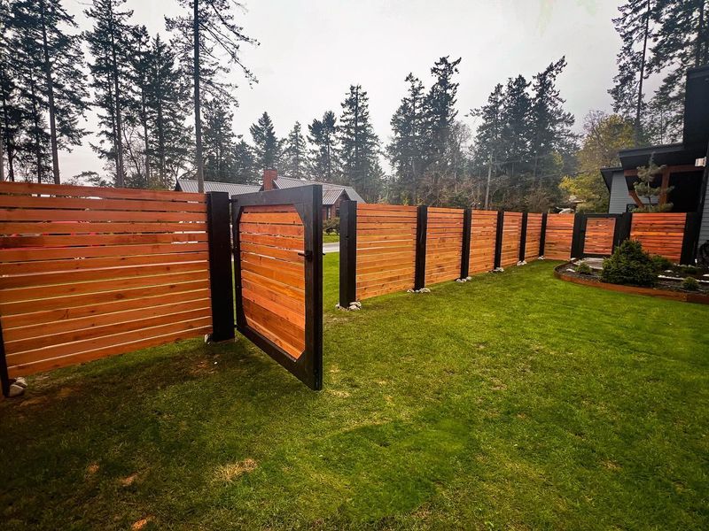 Black Metal And Wood Combo Fence