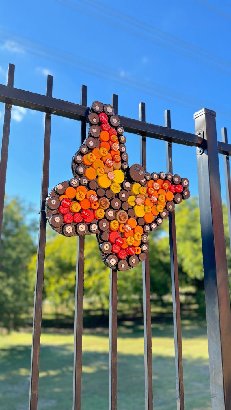 Bottle Cap Fence Art