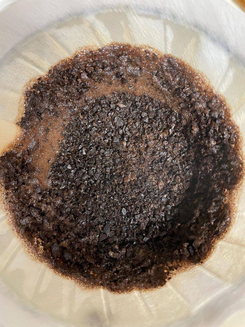 Sprinkle Used Coffee Grounds Regularly