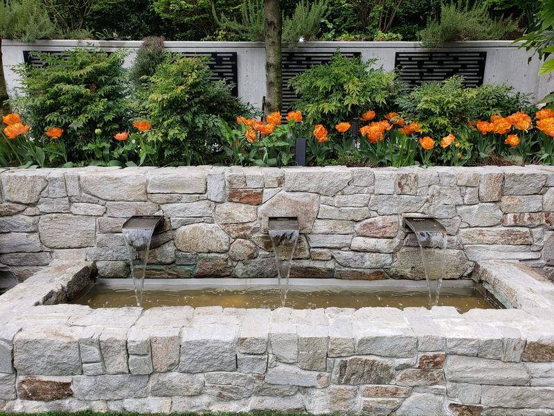 Stone Wall with Fountains