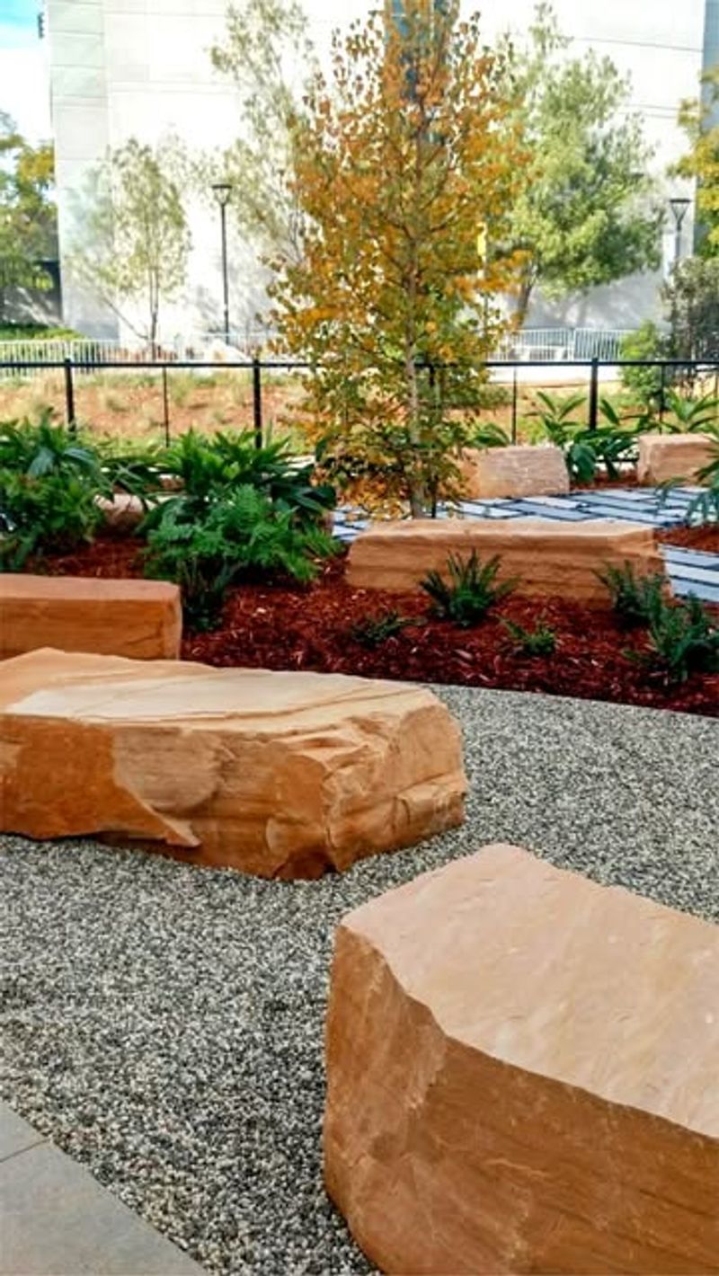 Add Decorative Boulders And Hardscaping