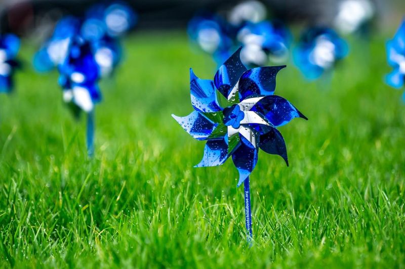 Hang Shiny Pinwheels Throughout Garden