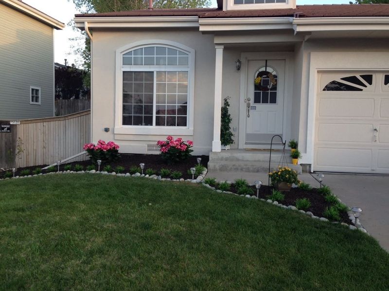 Artificial Flowers In Garden Beds