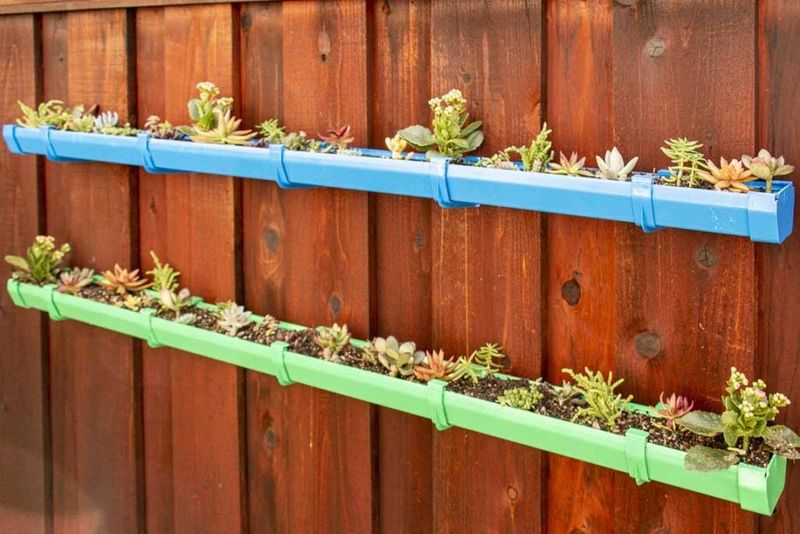 Fence-Mounted Gutter Gardens