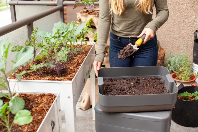 woman maintains balcony garden