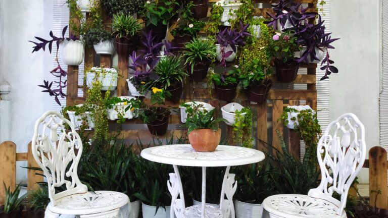 living wall behind two chairs and a table