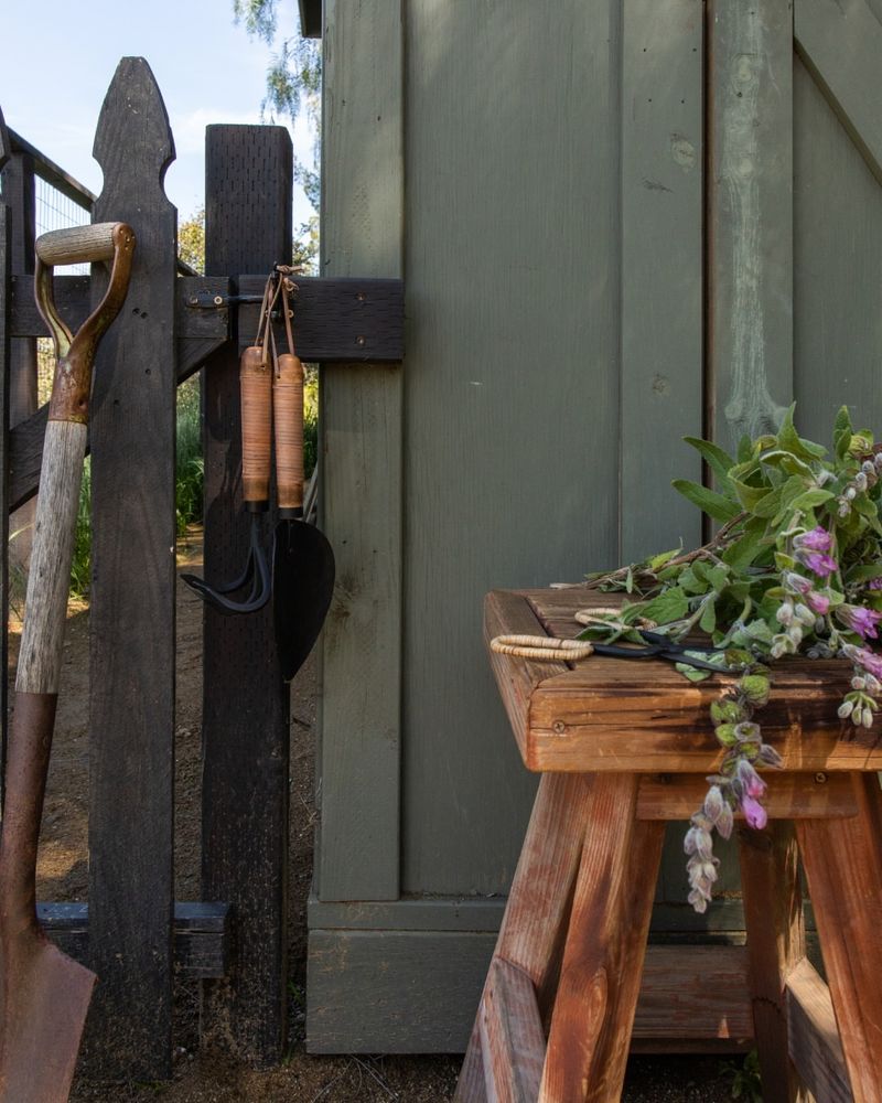 Display Wooden-Handled Tools As Garden Art