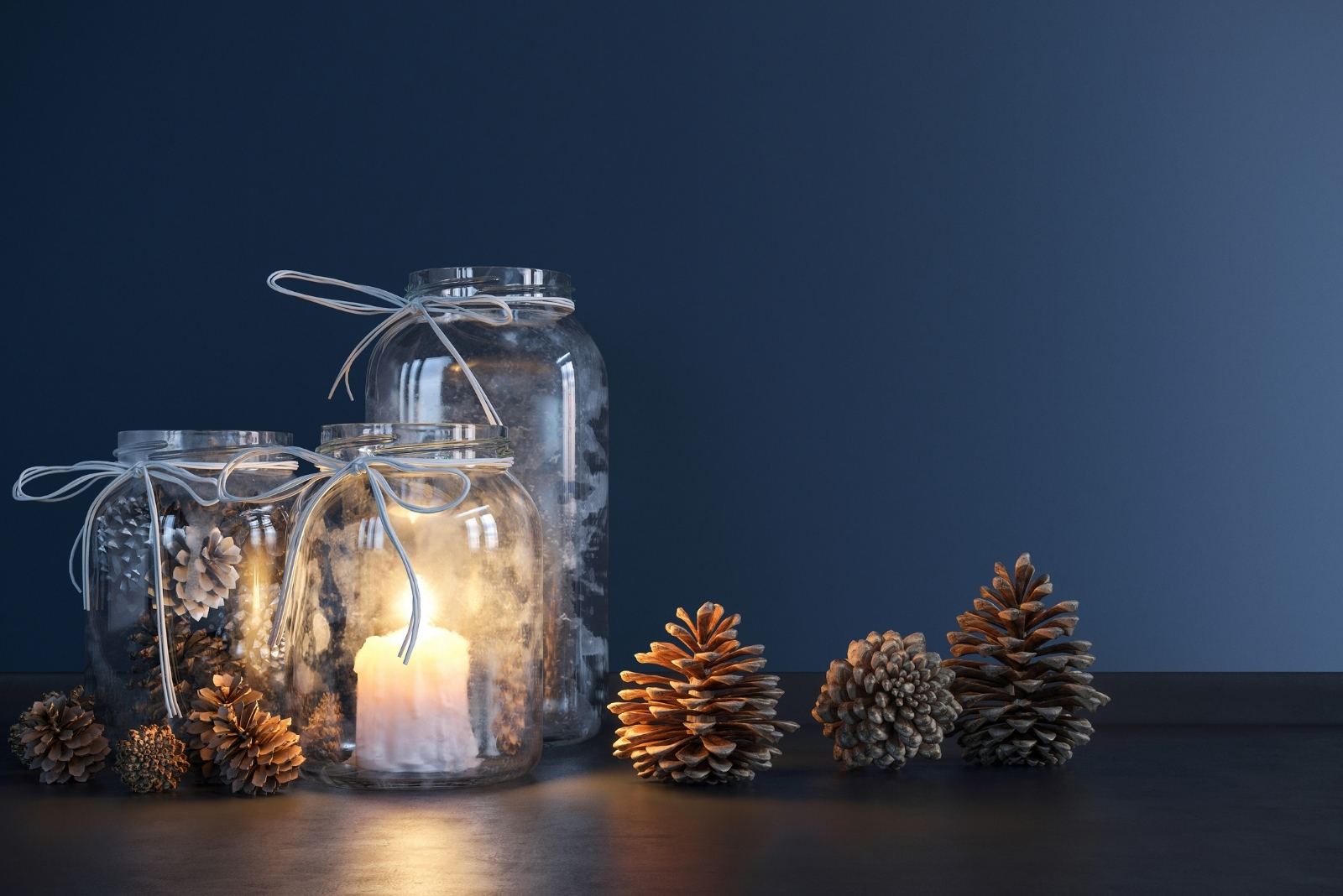 Mason Jar with candles and pines (featured image)