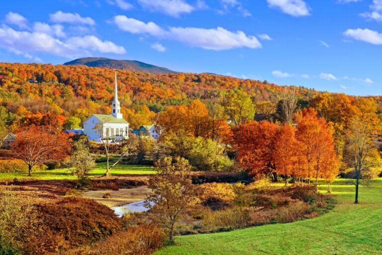 Autumn countryside view of the town of Stowe with white church and fall colors, Vermont