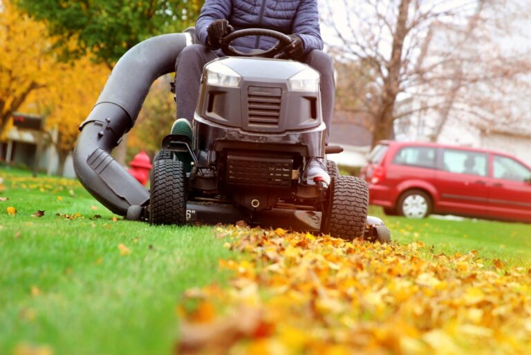 Mowing the grass with a lawn tractor mower