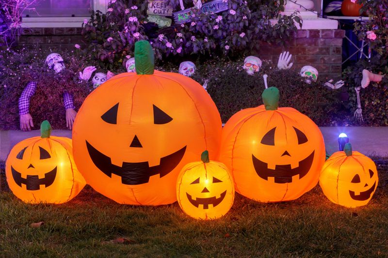 Plastic Pumpkins Left On Grass