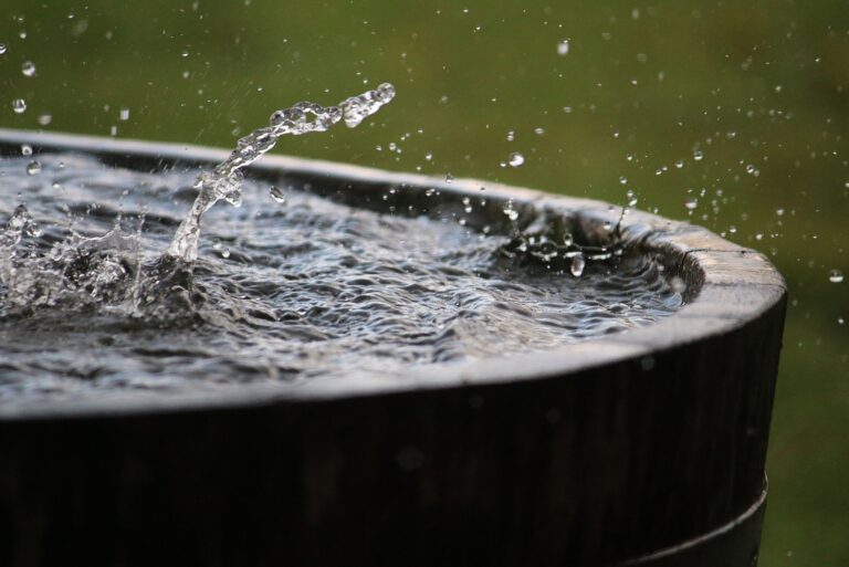 rain is falling in a wooden barrel