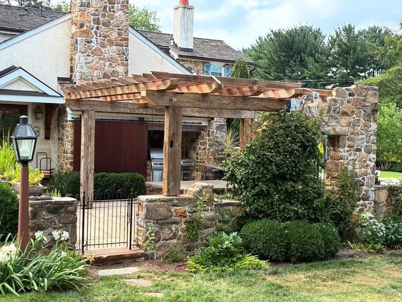 Stone Pillar Arbor With Overhead Beams