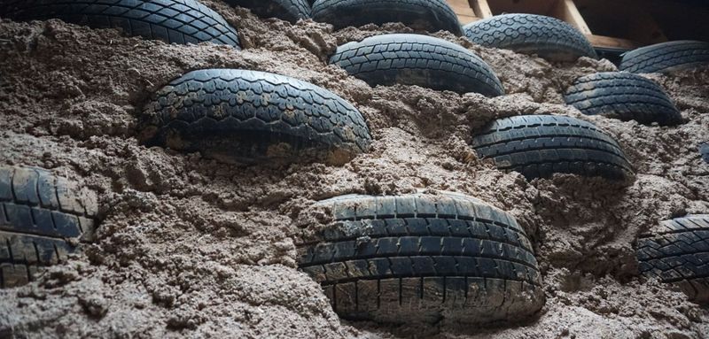 Concrete-Filled Tire Block Wall